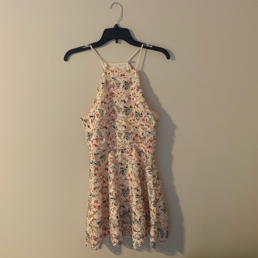 Tularosa mini dress, cream with flowers.